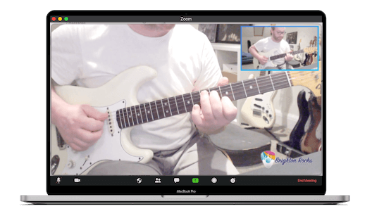 Laptop showing guitar lessons in Brighton